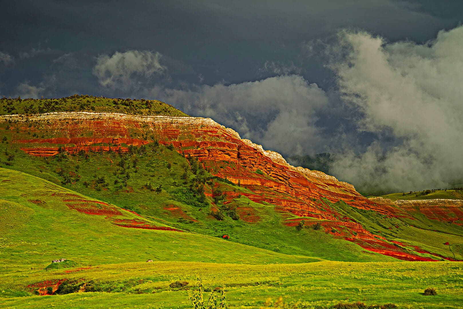 Red Rocks, Dark Clouds Absaroka Light Photography