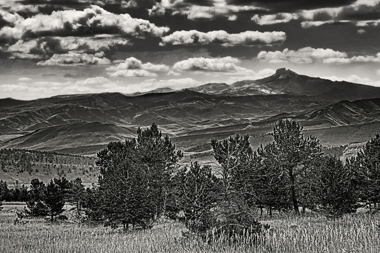 A black and white Portrait of Heart Mountain