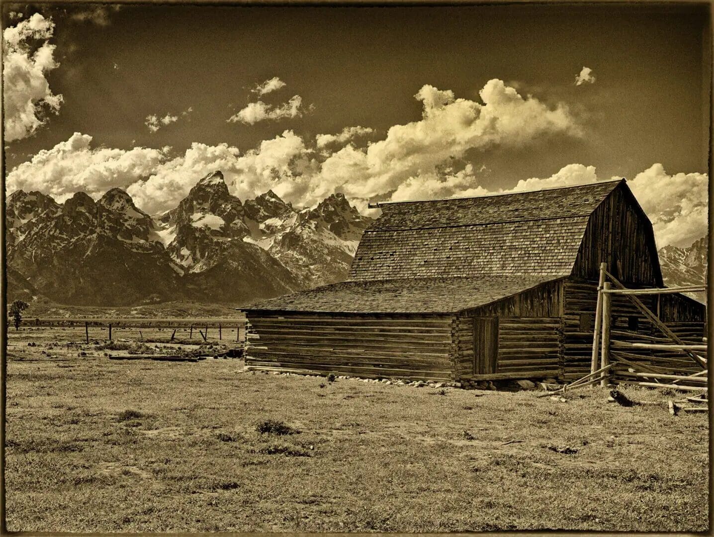 Moulton Barn in sepia view on the website