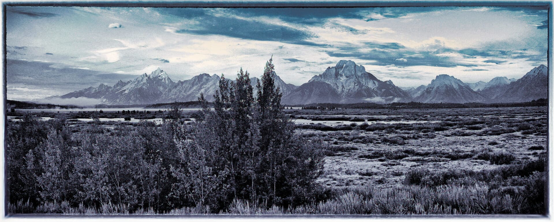 A black and white photo of mountains.