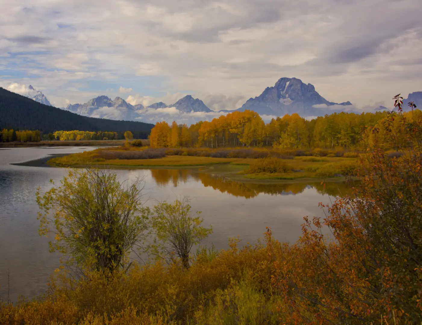 A lake surrounded by mountains.